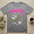 Chinese Mantis Feral T-Shirt in Sport Grey — Pastel Chinese mantis with raised spiked forelegs among leaves and blossoms, jagged magenta metal wordmark "MAN EATER" above.