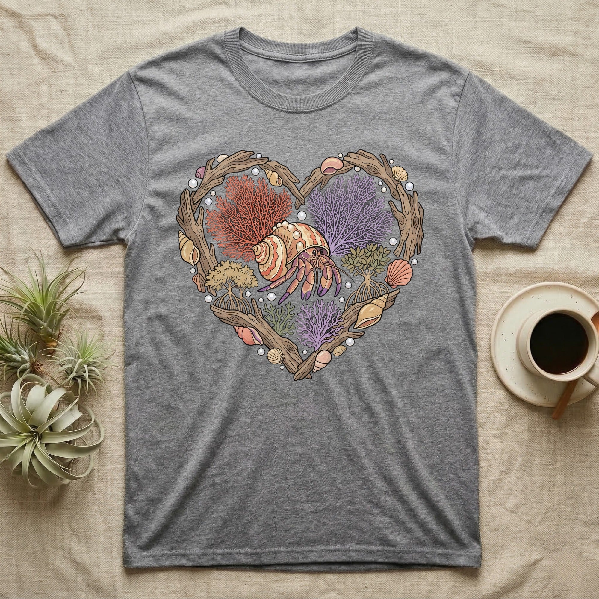 Grey t-shirt with heart-shaped marine life graphic.