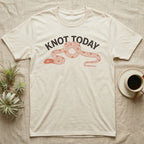 Corn Snake Knot Today T-Shirt in Natural — Worn-stamp corn snake stretched into a half-tied bow beneath a fat arched "KNOT TODAY" headline.