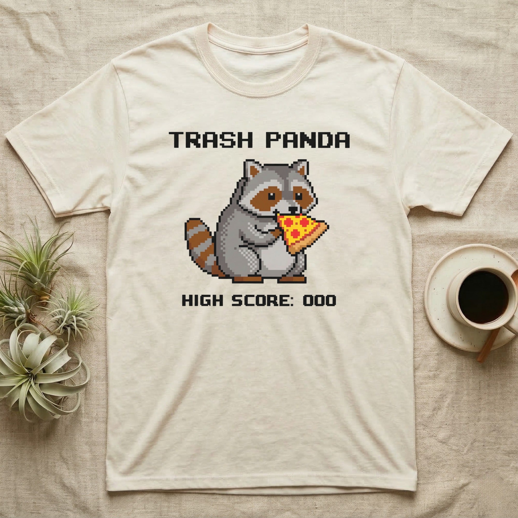 Pixelated raccoon eating pizza with "Trash Panda" and "High Score: 000" text.