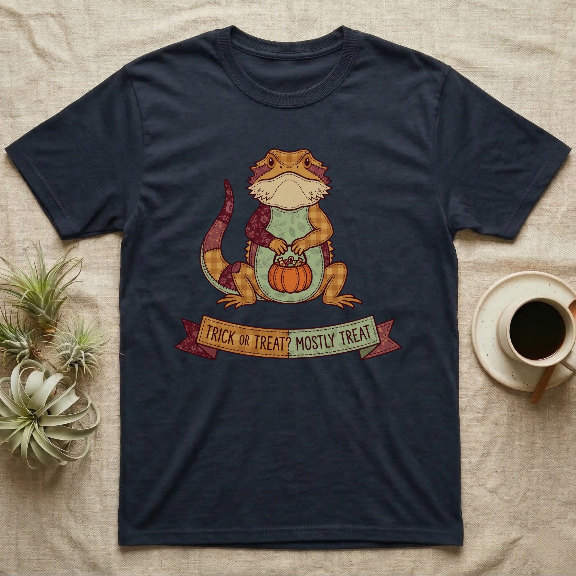 Bearded Dragon Mostly Treat T-Shirt in Navy — Patchwork-quilt bearded dragon holding a pumpkin pail, banner reading "Trick or Treat? Mostly Treat."