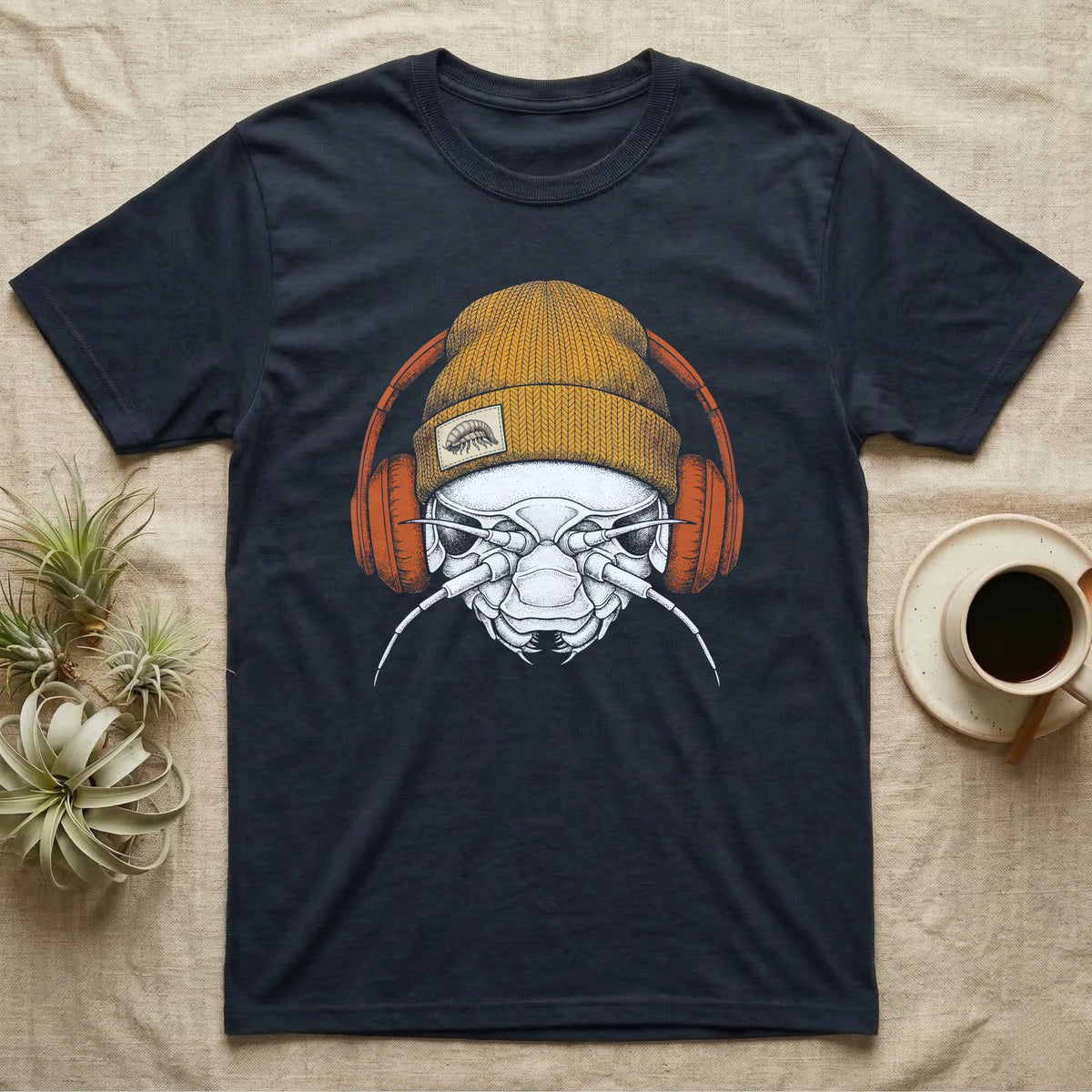 Isopod Heavy Beats T-Shirt in Navy — Engraved isopod with detailed chitin plating and antennae, wearing a knit beanie and over-ear headphones.