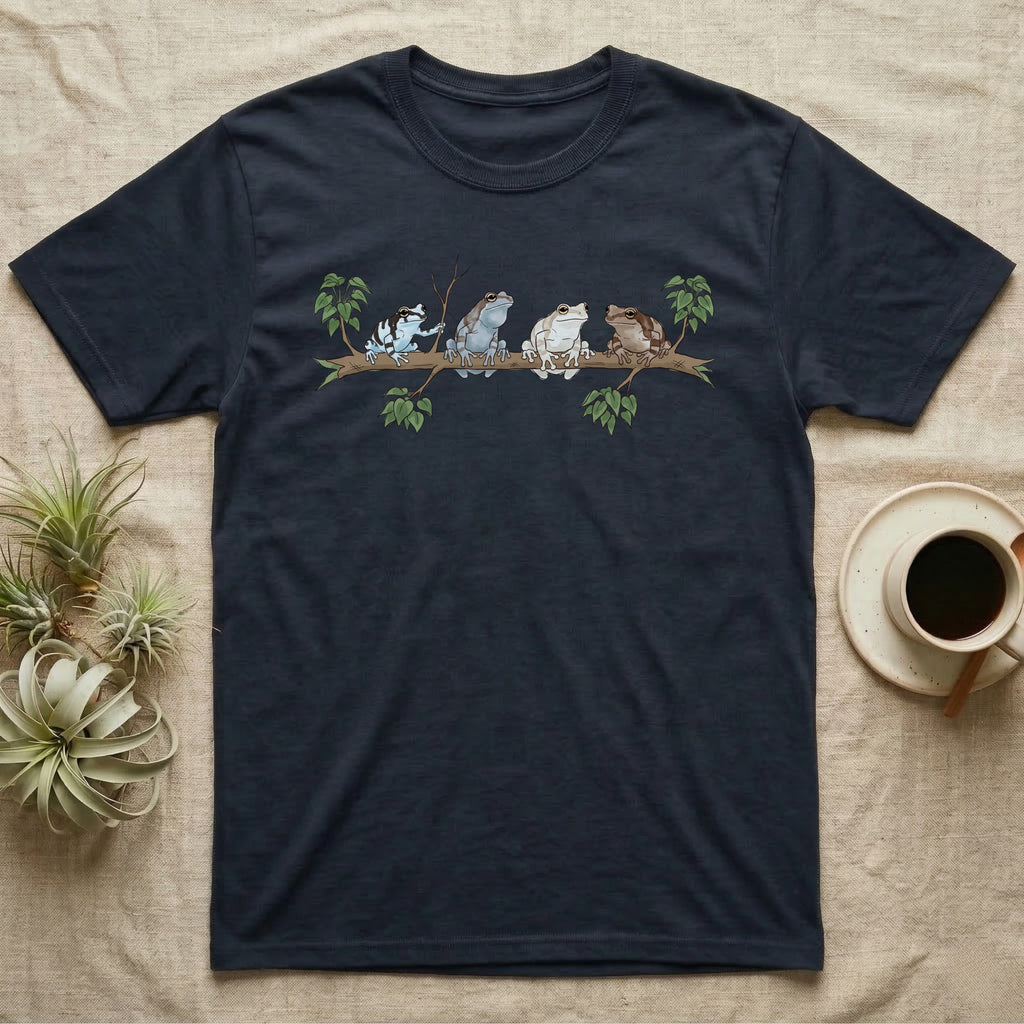 Amazon Milk Frog Branch T-Shirt in Navy — Four banded Amazon milk frogs perched along one slender branch, drawn in loose ink line and soft watercolour wash.