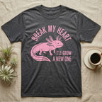 Axolotl Regrow T-Shirt in Dark Heather — Worn one-ink pink axolotl walking side-on, gills spread, under Break My Heart, I'll Grow a New One