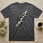 Dark grey t-shirt with black lizard illustration on a tree branch.