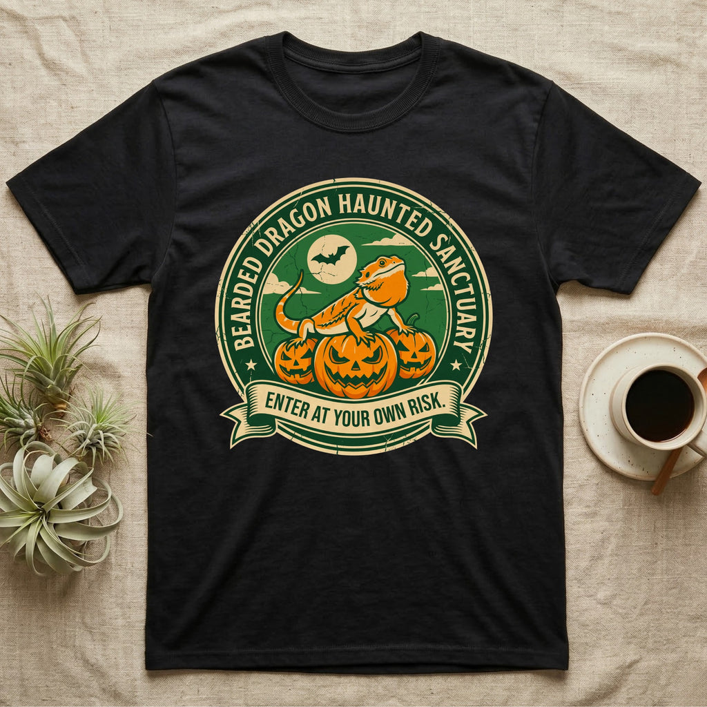 Bearded Dragon Haunted Sanctuary T-Shirt in Black — Vintage badge of a bearded dragon on glowing pumpkins under a moon, "Bearded Dragon Haunted Sanctuary."