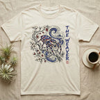 Cream t-shirt with a spider, branches, and waves design.