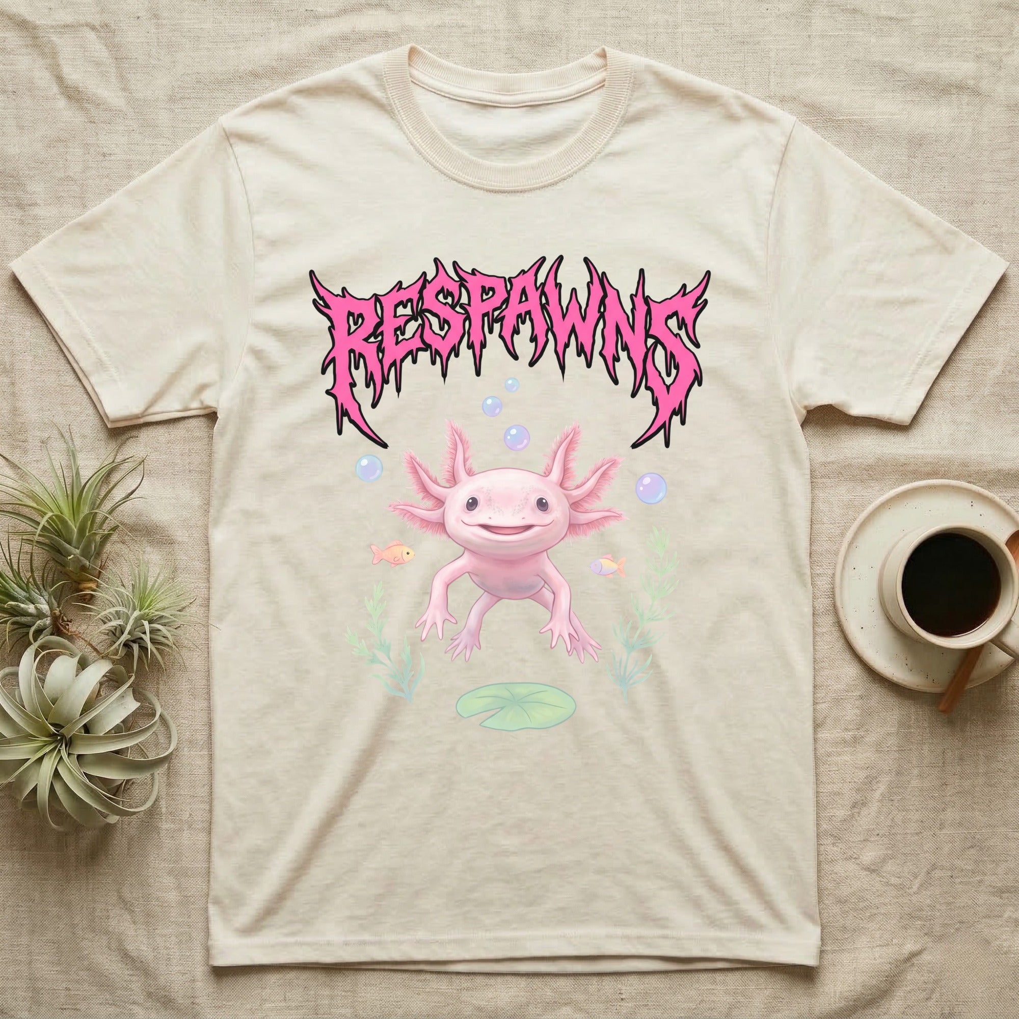 Axolotl Feral T-Shirt in Natural — Smiling pink axolotl floating in a pastel underwater scene under a spiky hot-pink metal wordmark reading RESPAWNS.