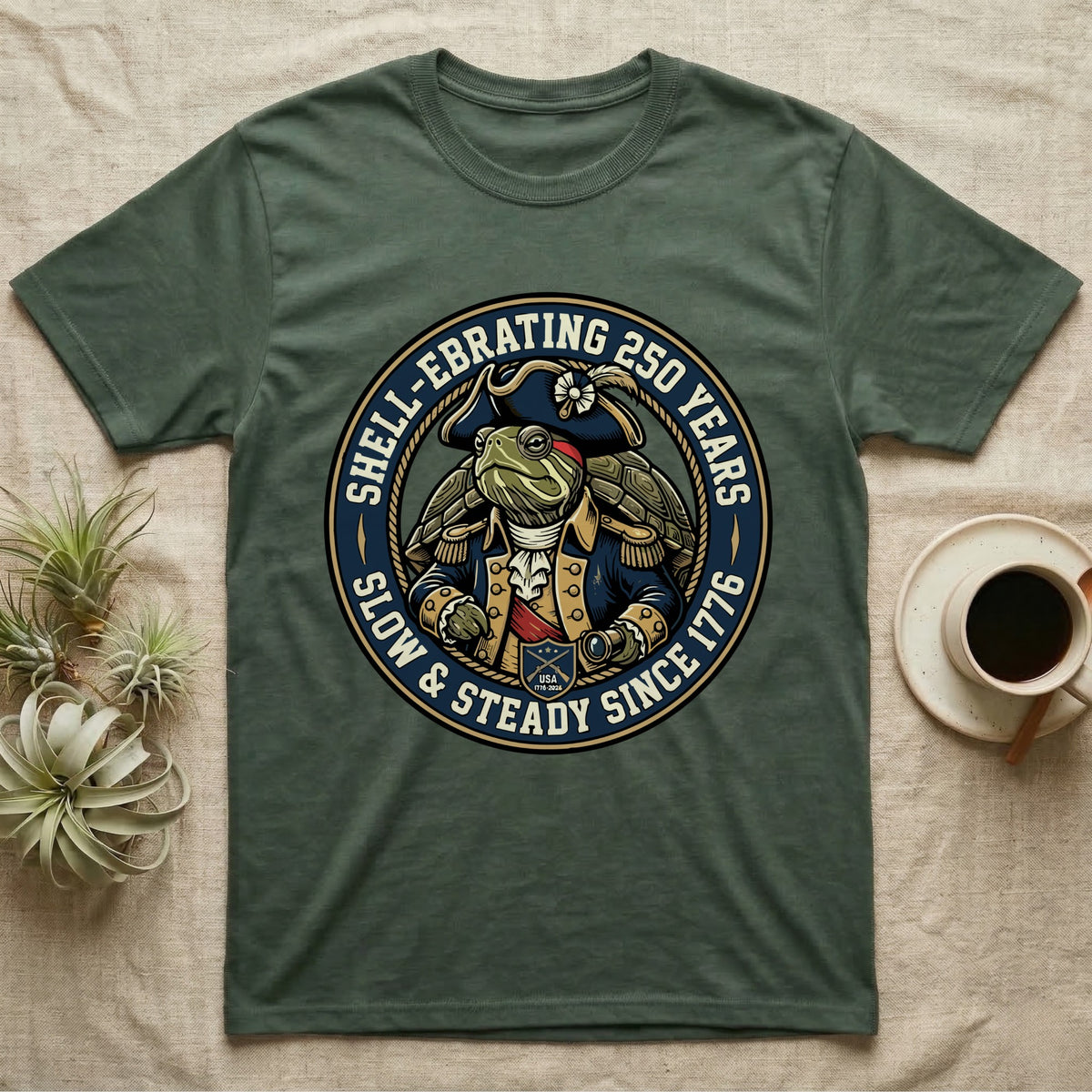 Sea Turtle General T-Shirt in Military Green — Circular crest of a sea turtle dressed as a Continental general with text Shell-Ebrating 250 Years.