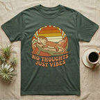 Green t-shirt with a bearded dragon and "No Thoughts Just Vibes" text.