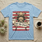 Tarantula We The Peeps T-Shirt in Light Blue — Detailed tarantula over a distressed striped flag holding a banner scroll reading We The Peeps.