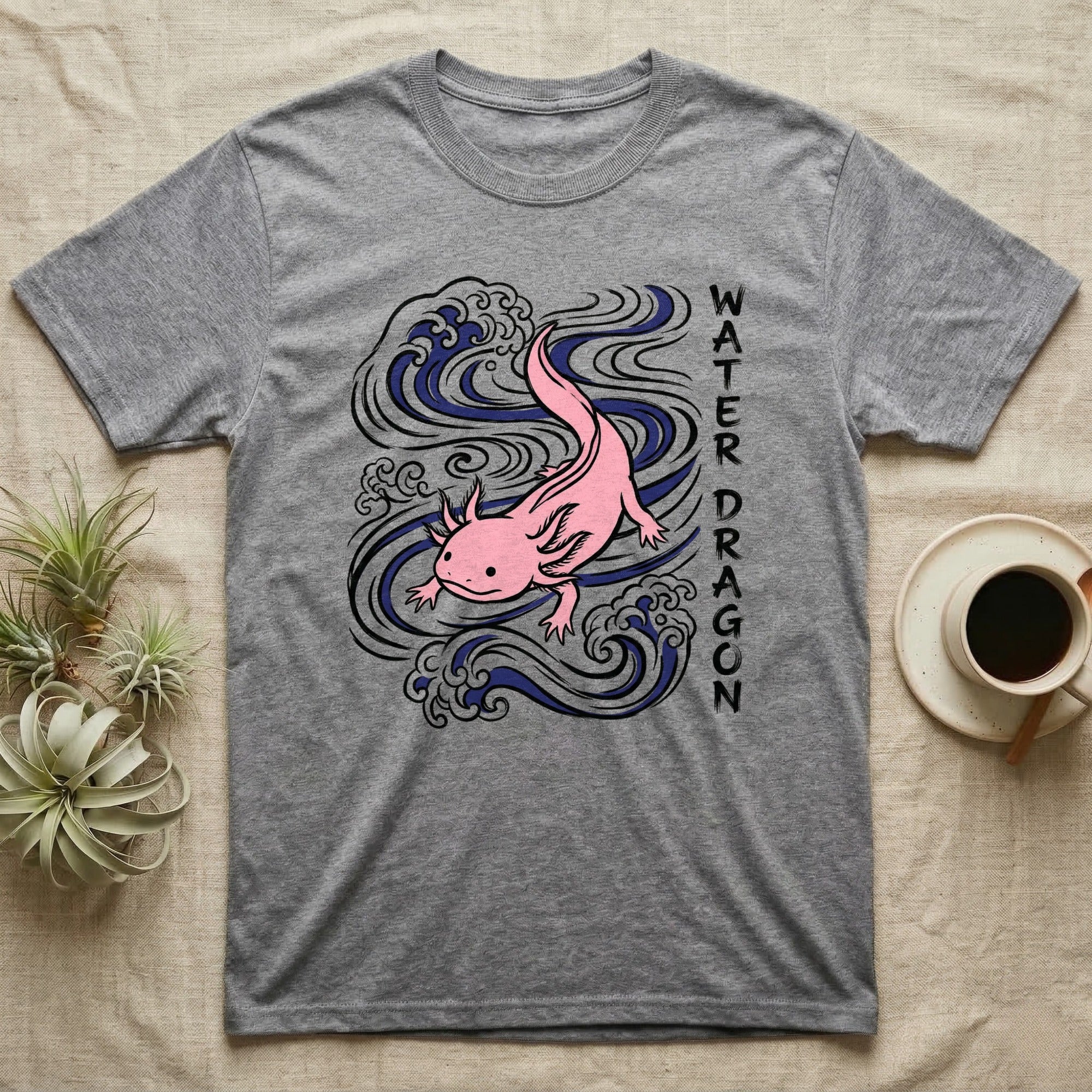 Grey t-shirt with pink axolotl and blue water waves graphic and "WATER DRAGON" text.