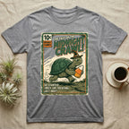 Tortoise Midnight Crawl Vintage T-Shirt in Sport Grey — Worn pulp comic cover of a witch-hatted tortoise dashing with a candy pail, "Tales of the Midnight Crawl."