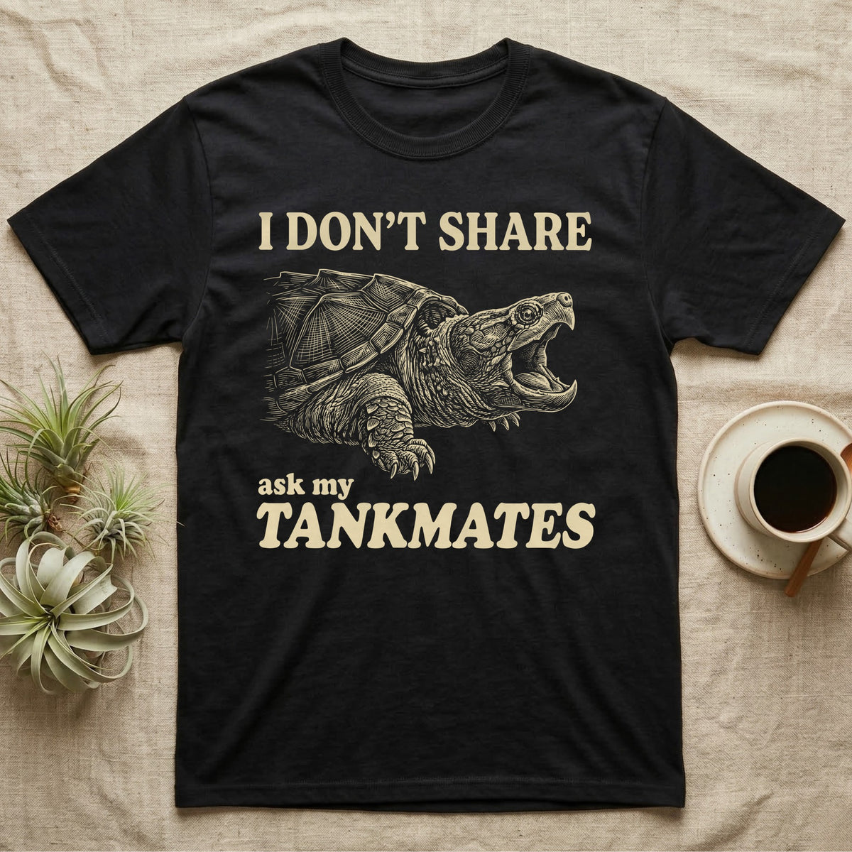 Snapping Turtle Gape T-Shirt in Black — Cream engraved snapping turtle on black, beak wide open, under cream words: I DON'T SHARE, ask my TANKMATES