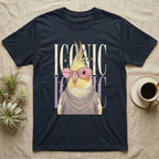 Cockatiel wearing sunglasses and pearls on a dark t-shirt.