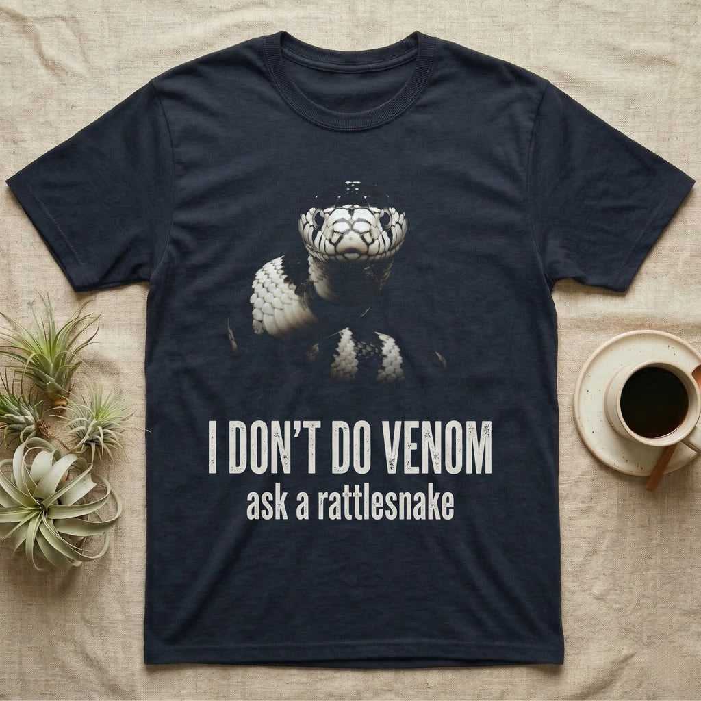 Deadpan photographic mugshot of a California kingsnake raised head-level to the camera above the distressed text I Don't Do Venom, ask a rattlesnake. — shown on a Navy tee.