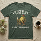 Red-Eared Slider Grudges T-Shirt in Military Green — Engraved red-eared slider lounging in a camp chair with tea under I Don't Hold Grudges I Let Them Slide