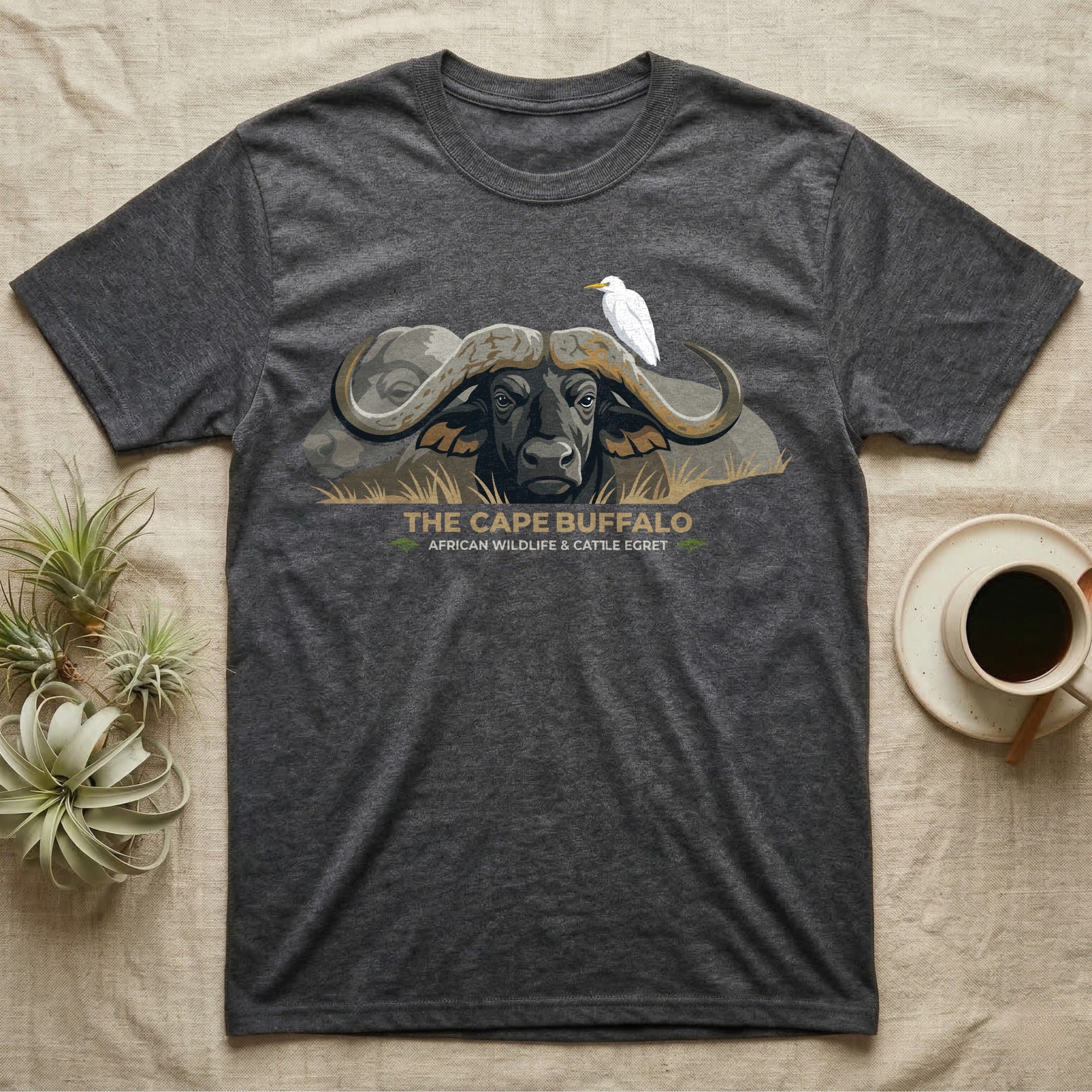 Charcoal t-shirt with cape buffalo and cattle egret graphic.