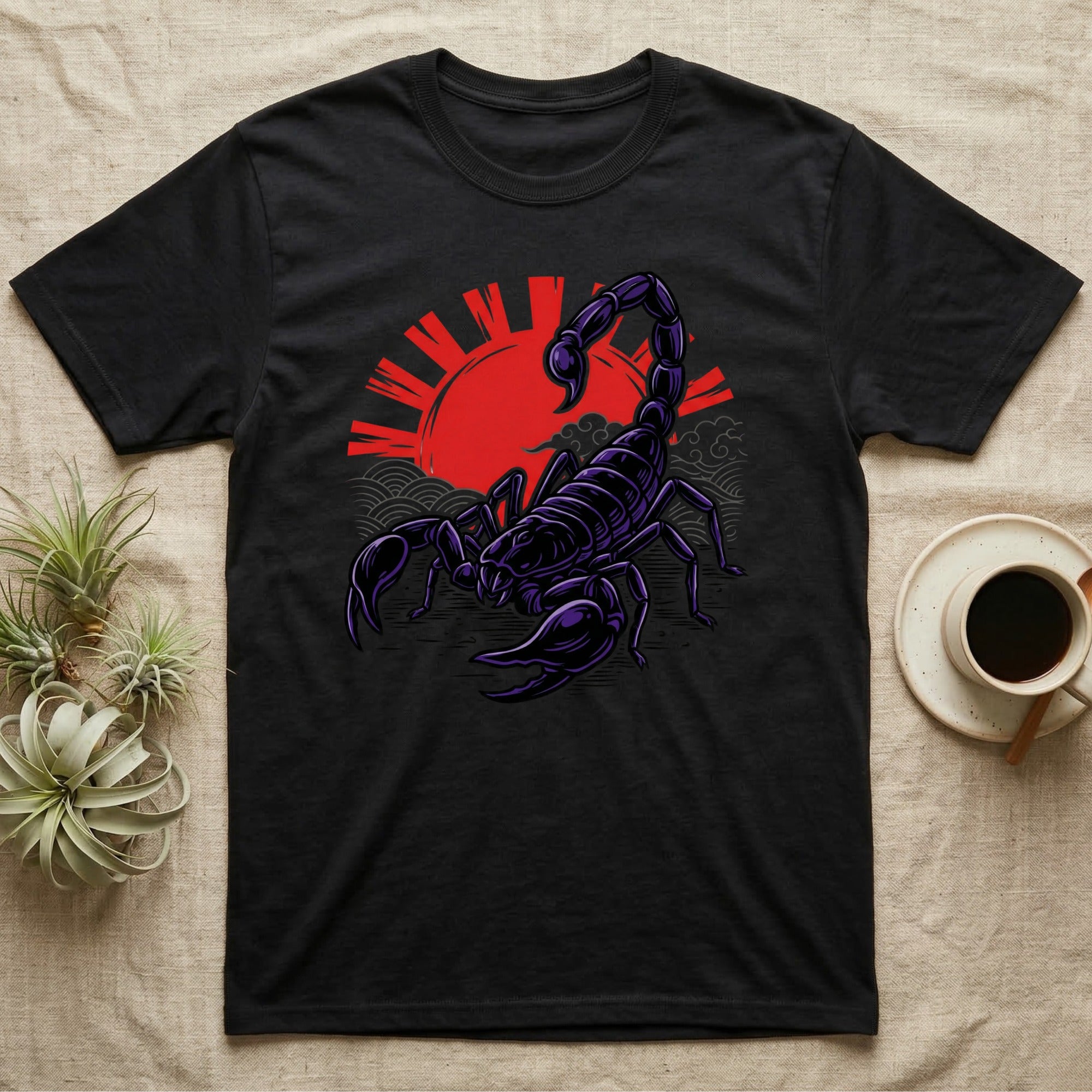 Black t-shirt with a purple scorpion and red sun design.