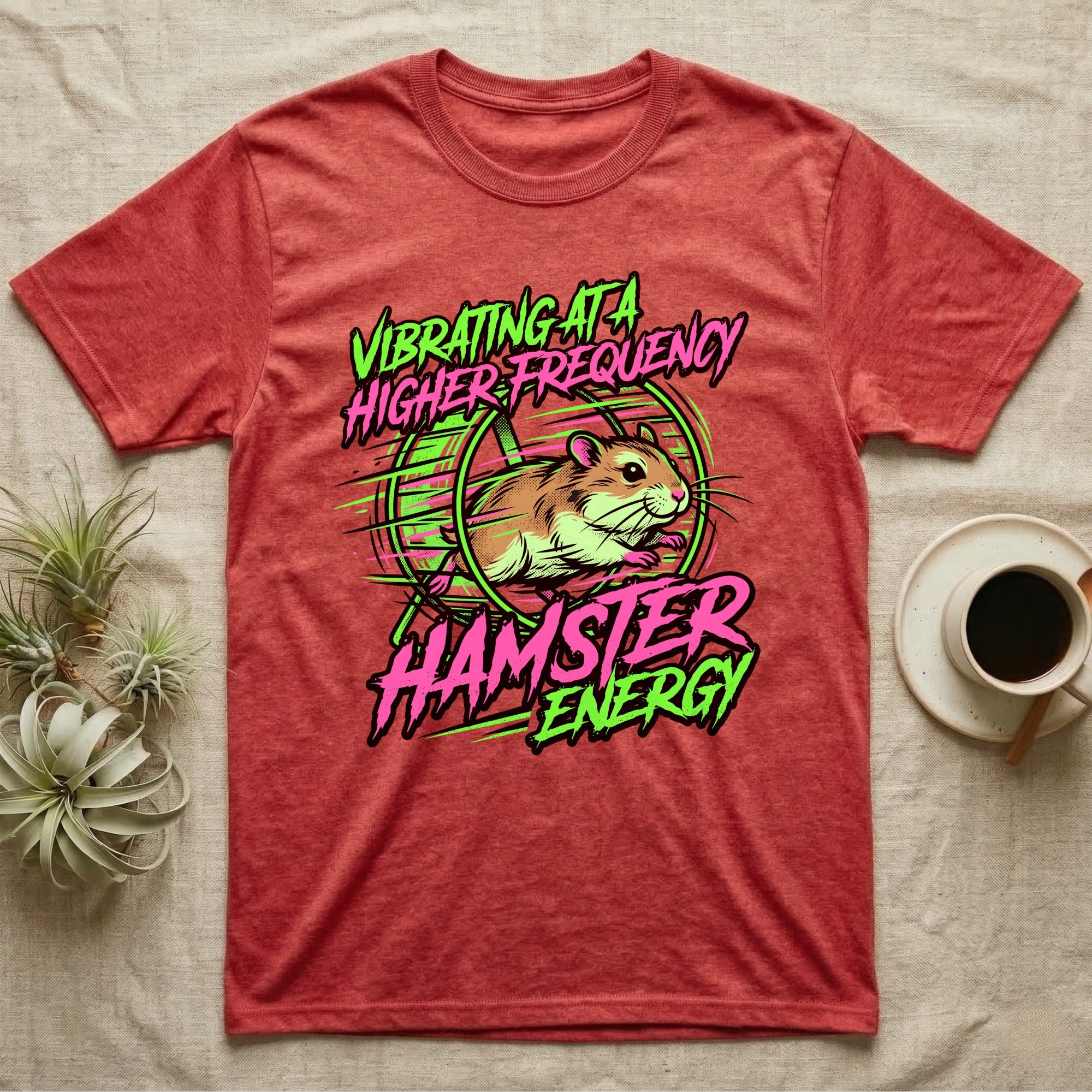 T-shirt with "VIBRATING AT A HIGHER HAMSTER ENERGY" text and a hamster running on a wheel.