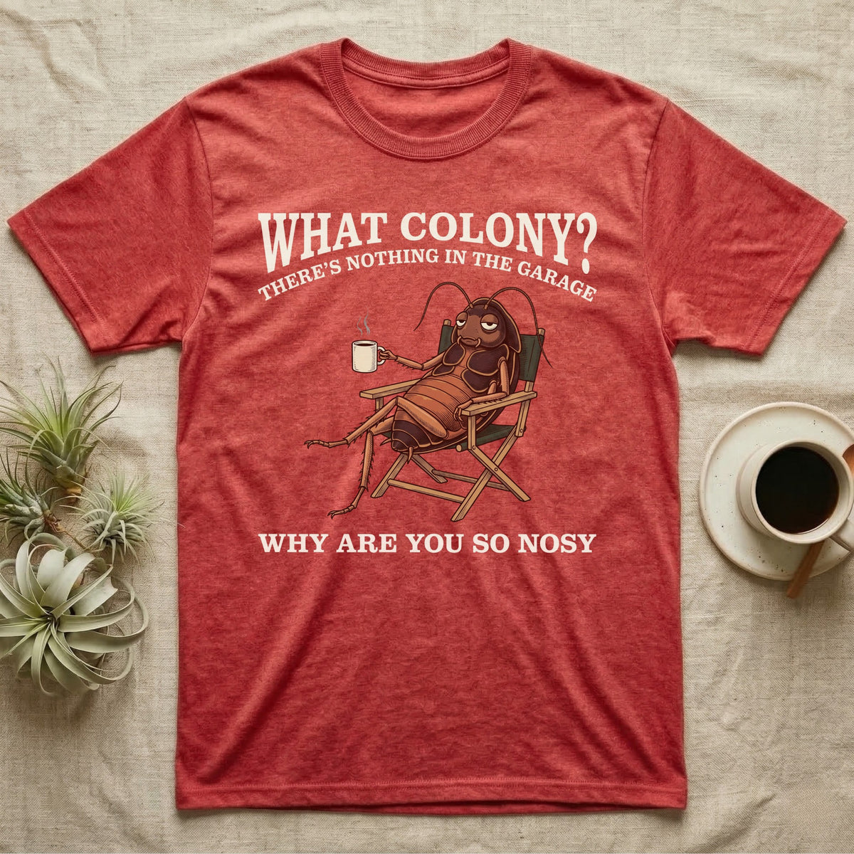 Reptile Roach Colony T-Shirt in Heather Red — Vintage engraving of a dubia roach lounging in a camp chair with coffee under arched text What Colony on charcoal grey