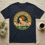 Navy t-shirt with "High Desert Sun Club" emblem, bearded dragon, sun, and "Est. 2026".