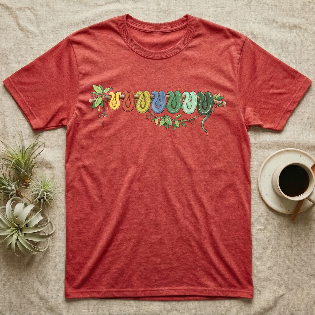 Green Tree Python Canopy Crew T-Shirt in Heather Red — Watercolor illustration of a green tree python in seven real colour-change stages coiled on a branch, dark grey T-shirt design.