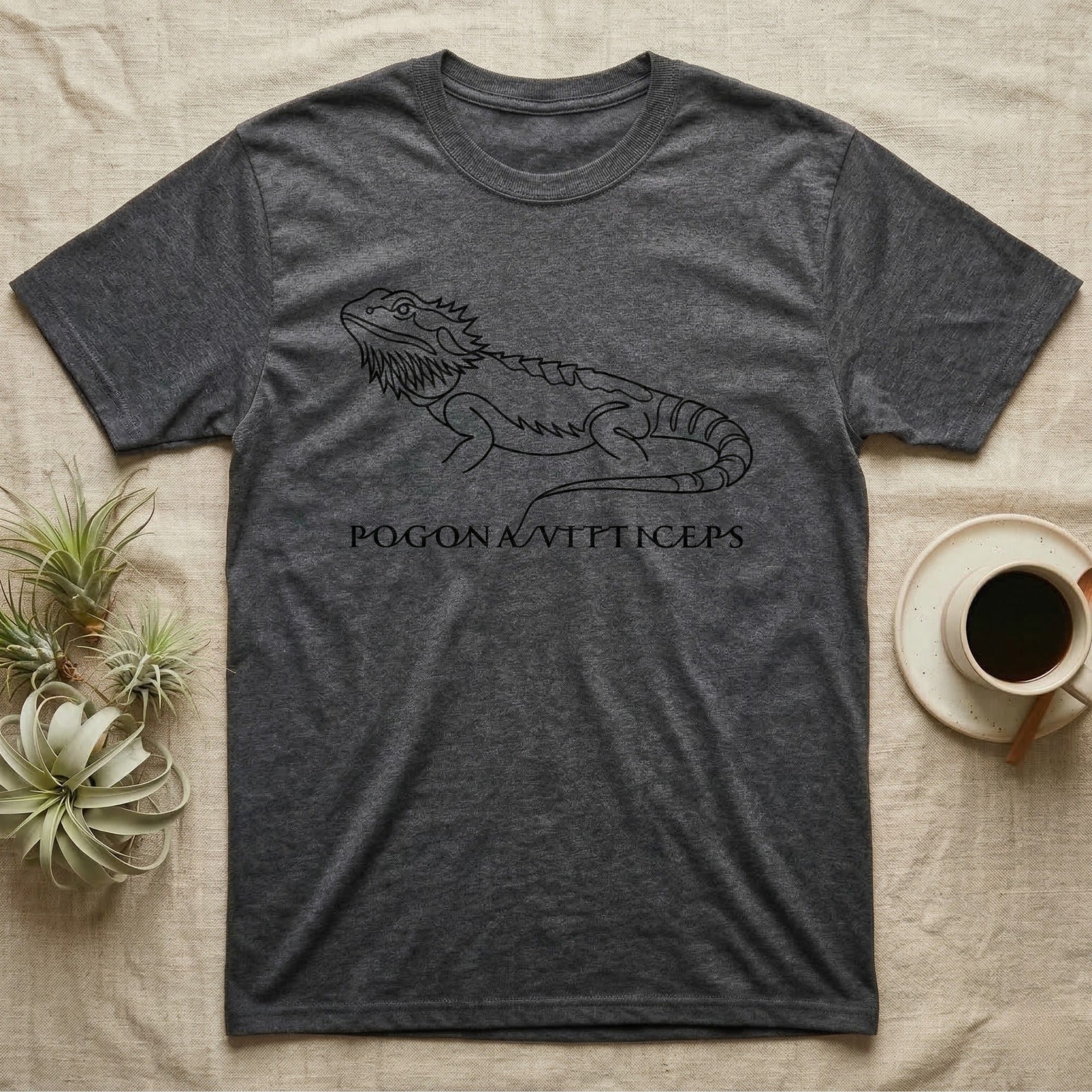 Dark grey t-shirt with a bearded dragon illustration and "POGONAVITICEPS" text.