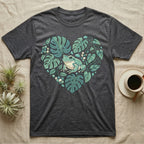 Dark grey t-shirt with heart-shaped tropical leaves and a frog graphic.
