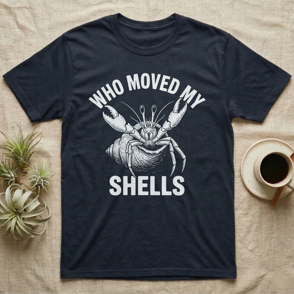 Hermit Crab Outrage T-Shirt in Navy — White-line engraving of a hermit crab flinging both claws up under the words Who Moved My Shells