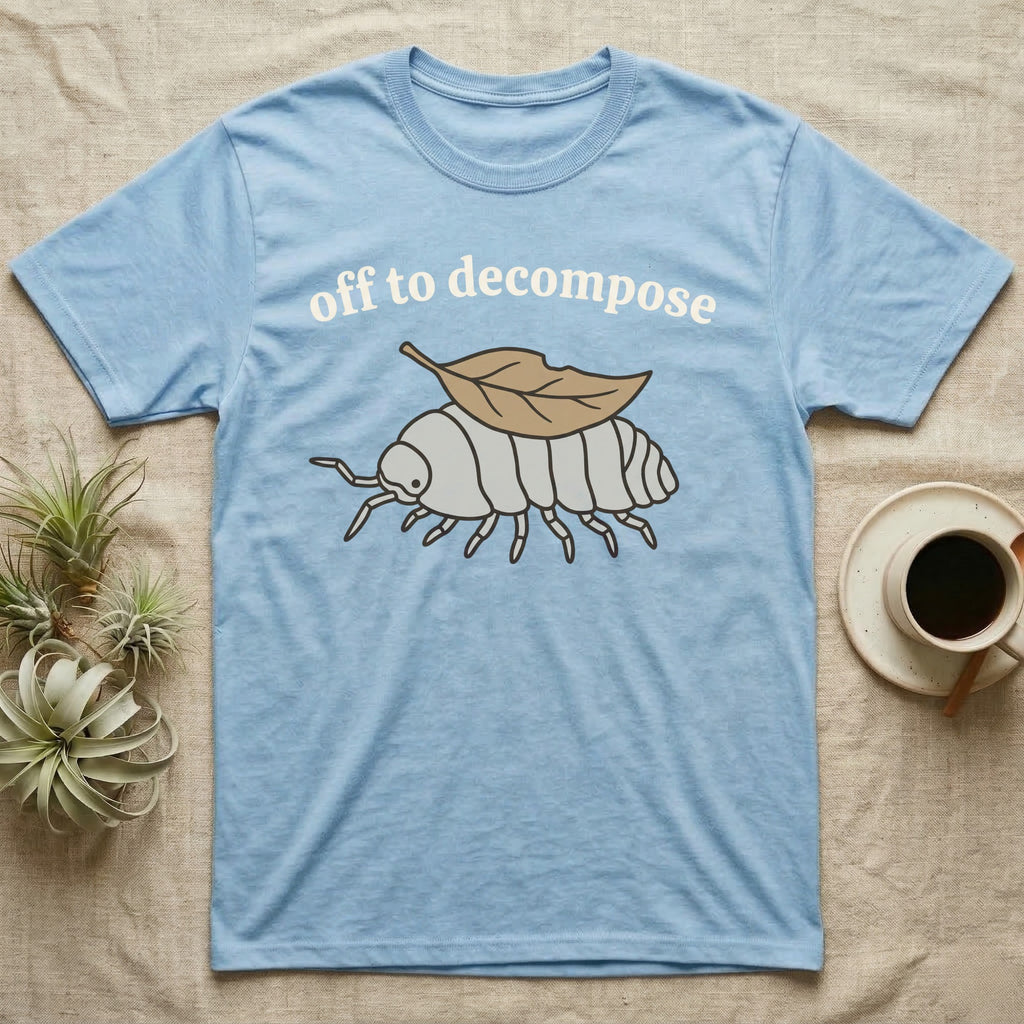 Isopod Decomposer T-Shirt in Light Blue — Minimal doodle of a grey isopod walking off with a dead leaf on its back under the words off to decompose