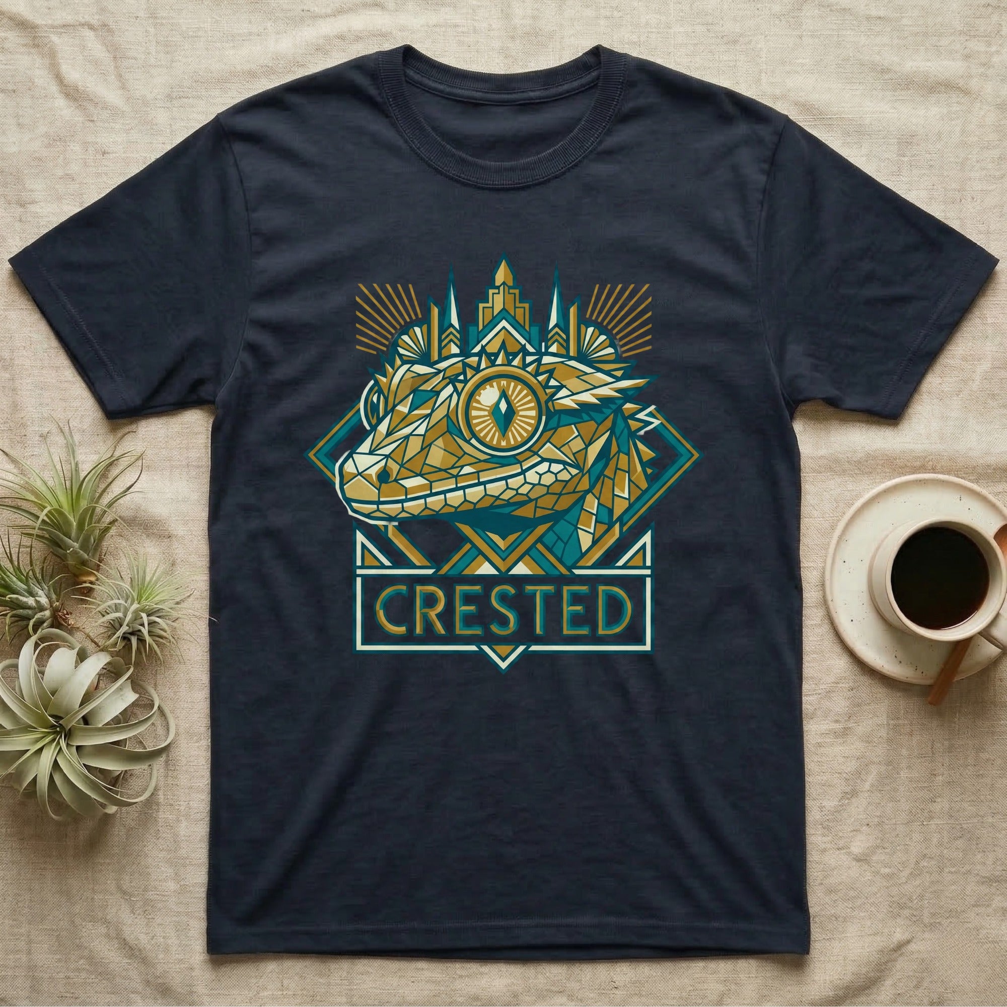 Navy t-shirt with geometric gecko design and "CRESTED" text.