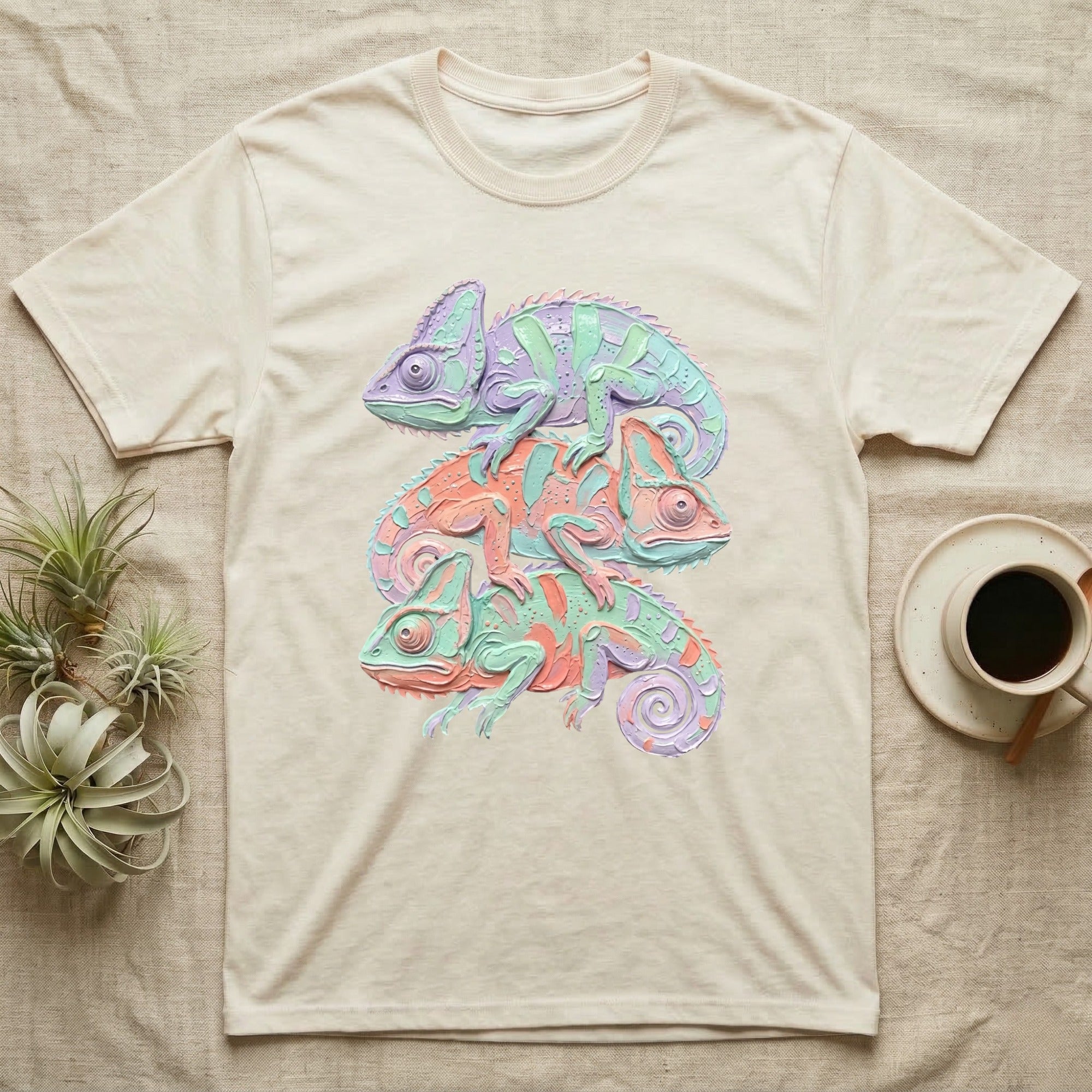 Cream t-shirt with a stacked pastel chameleon graphic.