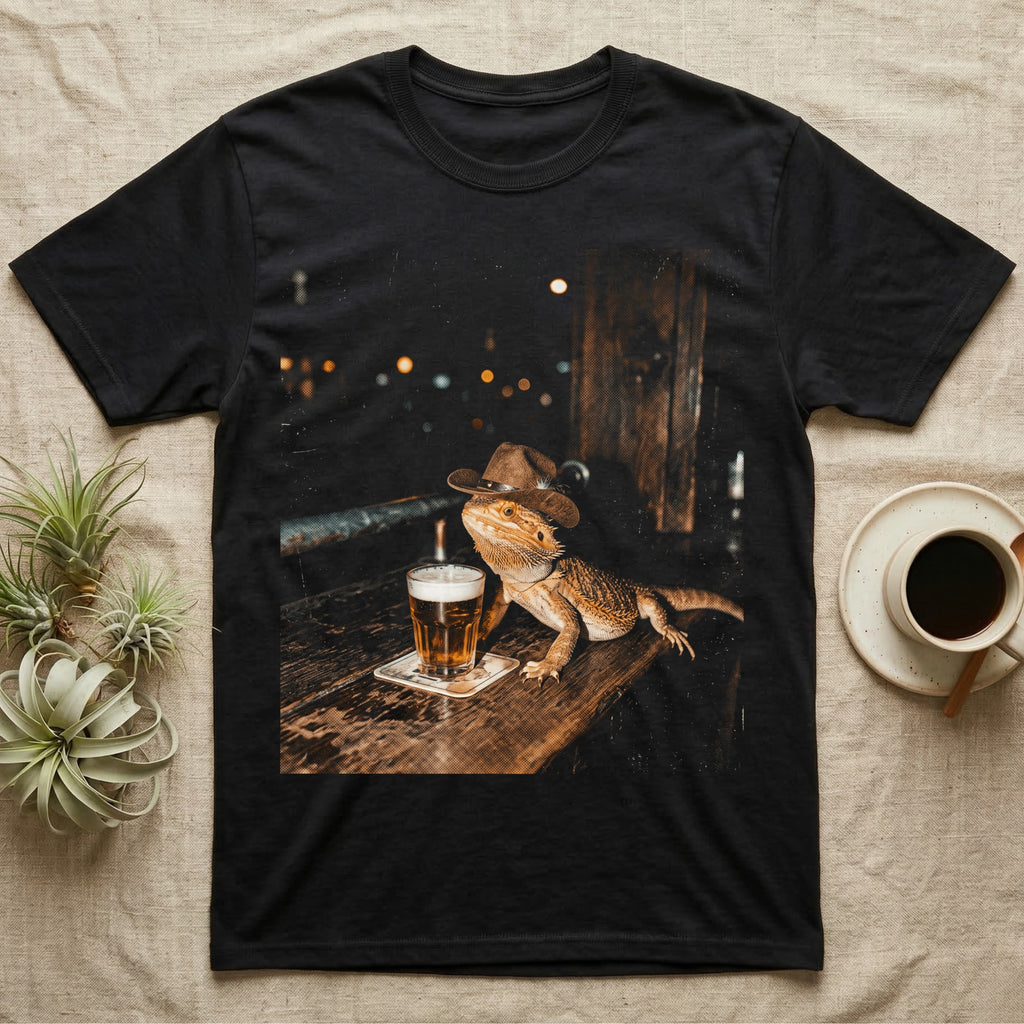 Bearded dragon in cowboy hat with beer next to blurred lights.