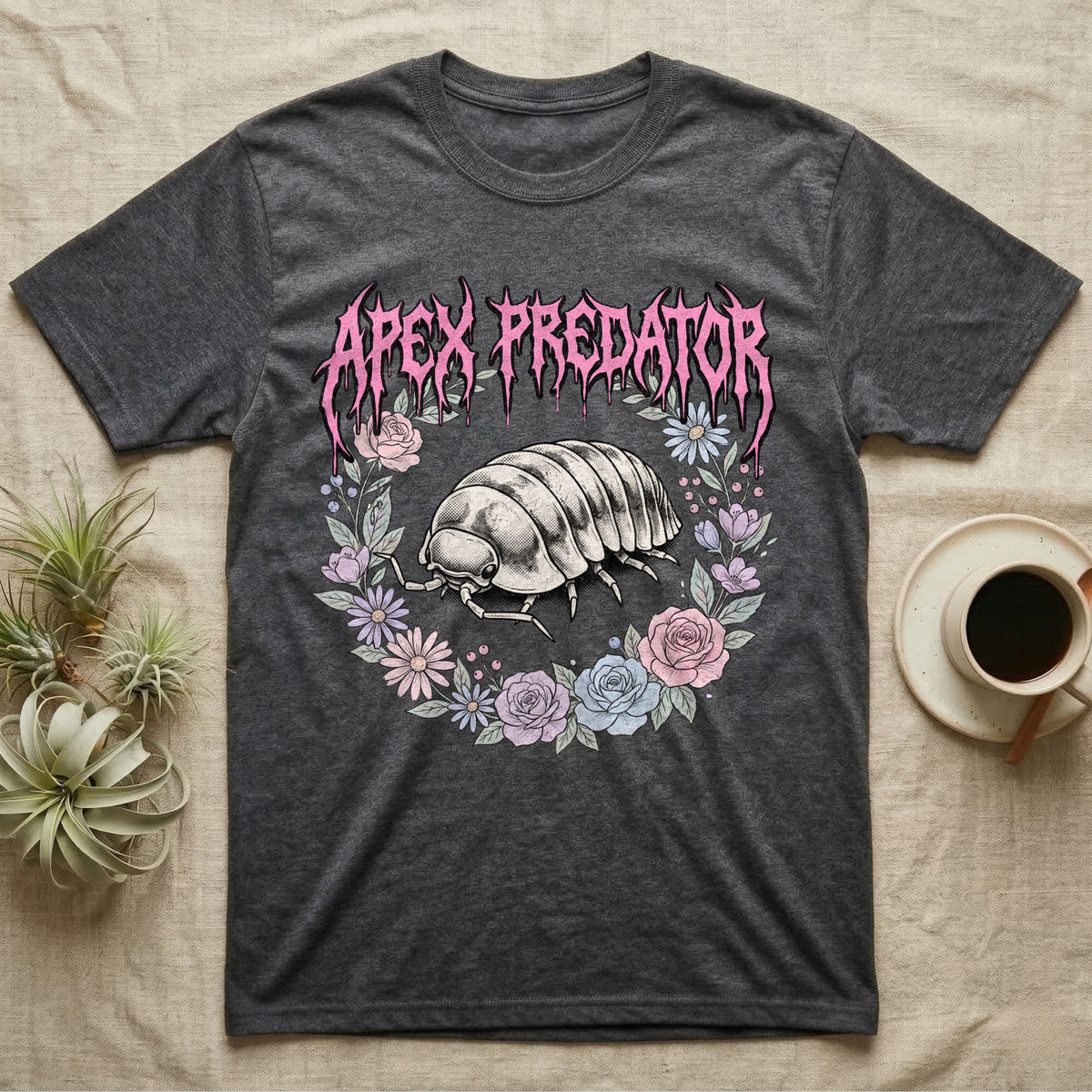 Apex Predator Isopod T-Shirt in Dark Heather — Bootleg design of a cute isopod in a floral wreath under dripping death-metal lettering reading "Apex Predator."