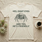 Jumping Spider Eight Eyes T-Shirt in Natural — Engraved jumping spider head-on with large forward eyes, between stitch-look lettering on grey.