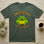 Green t-shirt with cartoon frog saying "I Must Scream For Crickets".