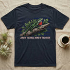 Green Anole 1776 T-Shirt in Navy — Realistic green anole with a red dewlap on a branch over a distressed flag under text Land of the Free, Home of the Green.