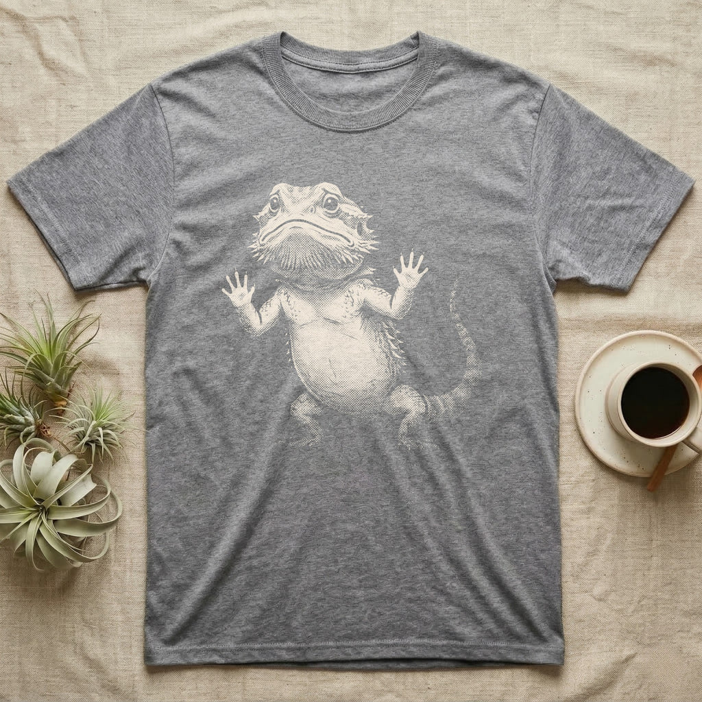 Begging Bearded Dragon T-Shirt in Sport Grey — Sad-meme halftone illustration of a bearded dragon standing upright with arms pressed to unseen glass, looking forlorn.