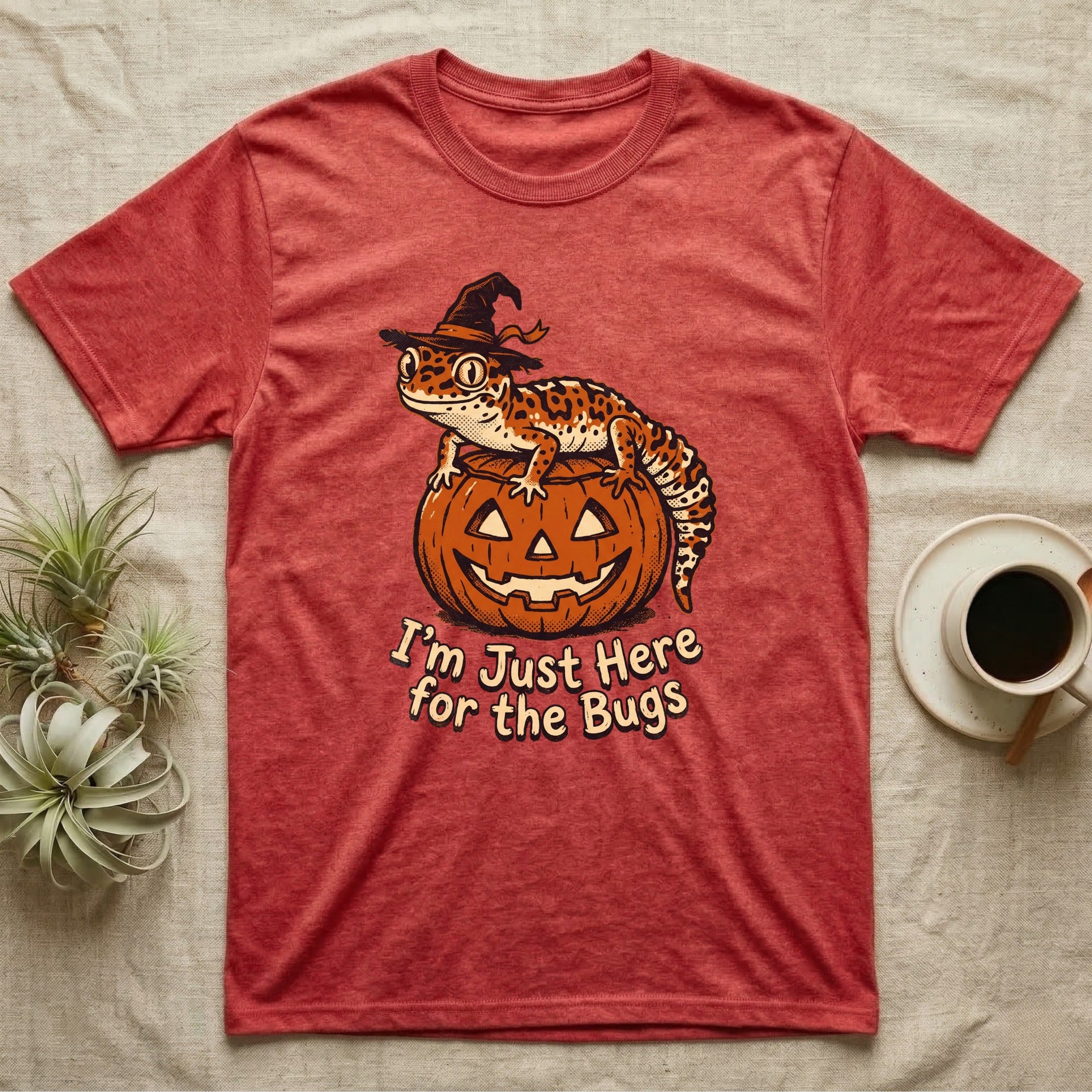 Leopard Gecko Here For Bugs T-Shirt in Heather Red — Vintage cartoon leopard gecko in a witch hat on a jack-o'-lantern, "I'm Just Here for the Bugs."