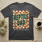 Dark gray t-shirt with "Reptile Dad" and reptile graphics.