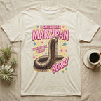 Millipede Almond Defence T-Shirt in Natural — Engraved giant African millipede coiled upright under fat pink club lettering reading ALMOND DEFENCE on yellow stripes.