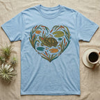 Light blue t-shirt with a heart-shaped wetland design featuring a turtle.