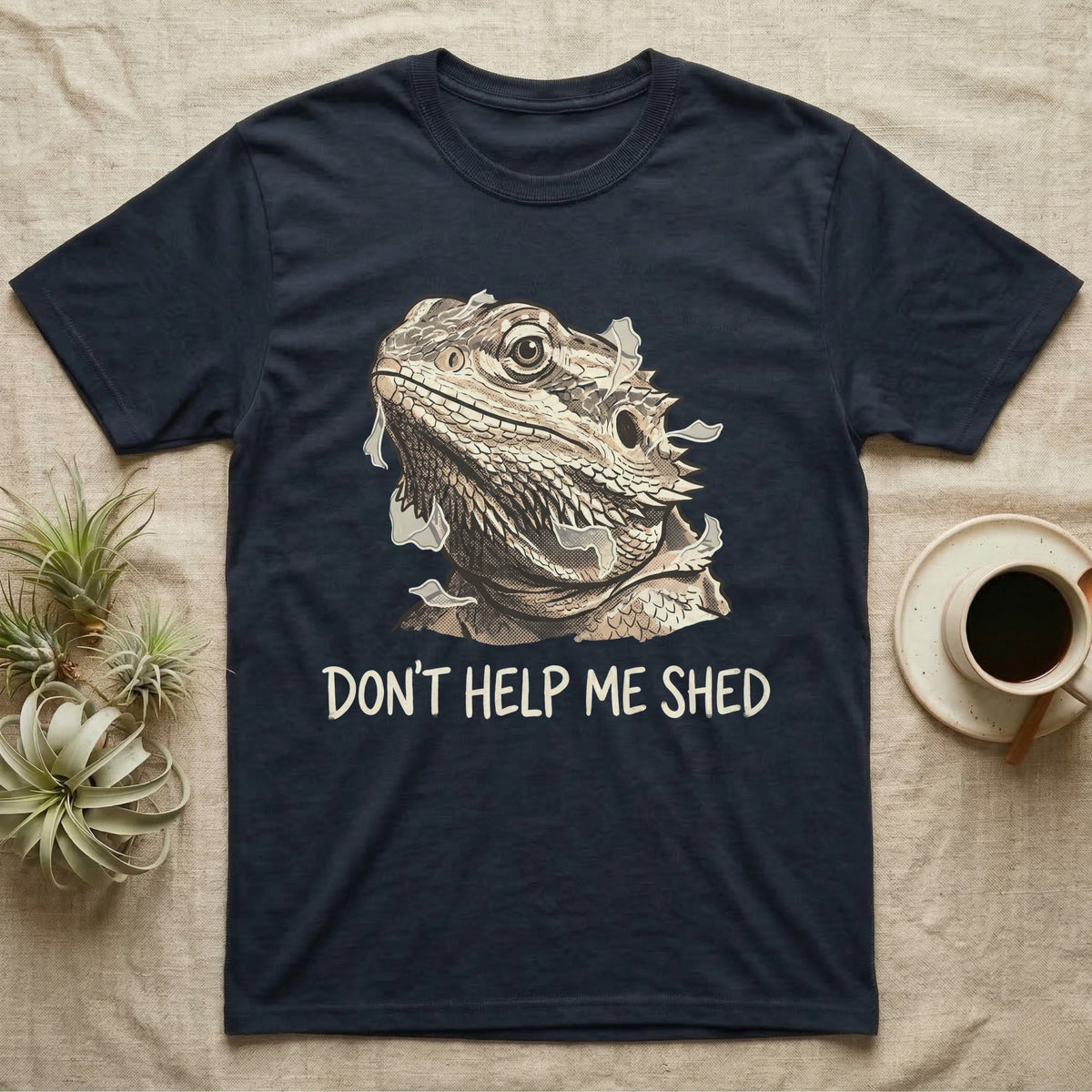 Don't Help Me Shed T-Shirt in Navy — Retro-illustration of a bearded dragon mid-shed with a deadpan side-eye and a marker caption reading Don't Help Me Shed.