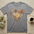 Grey t-shirt with a heart-shaped design of a fennec fox and autumn leaves.