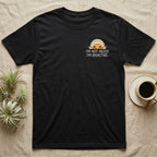 Bioactive Rubber Ducky T-Shirt in Black — Creamy-yellow rubber ducky isopod with an orange face peeking over white marker capitals reading I'M NOT MESSY I'M BIOACTIVE.