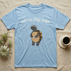 Box Turtle Herping T-Shirt in Light Blue — Minimal doodle of an eastern box turtle standing upright in a headlamp holding a flashlight, under the words off to flip logs