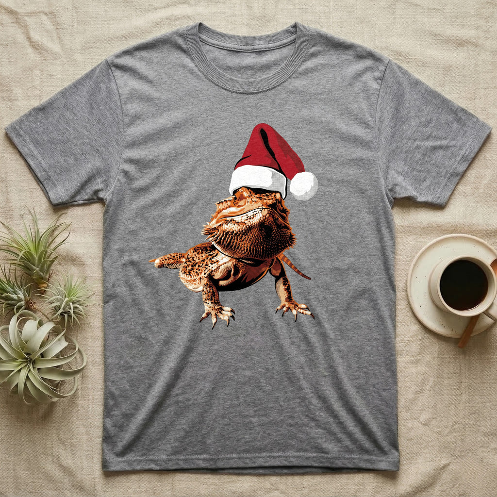 Vintage comic illustration of a bearded dragon wearing a red and white Santa hat, graphic-only, no text. — shown on a Sport Grey tee.