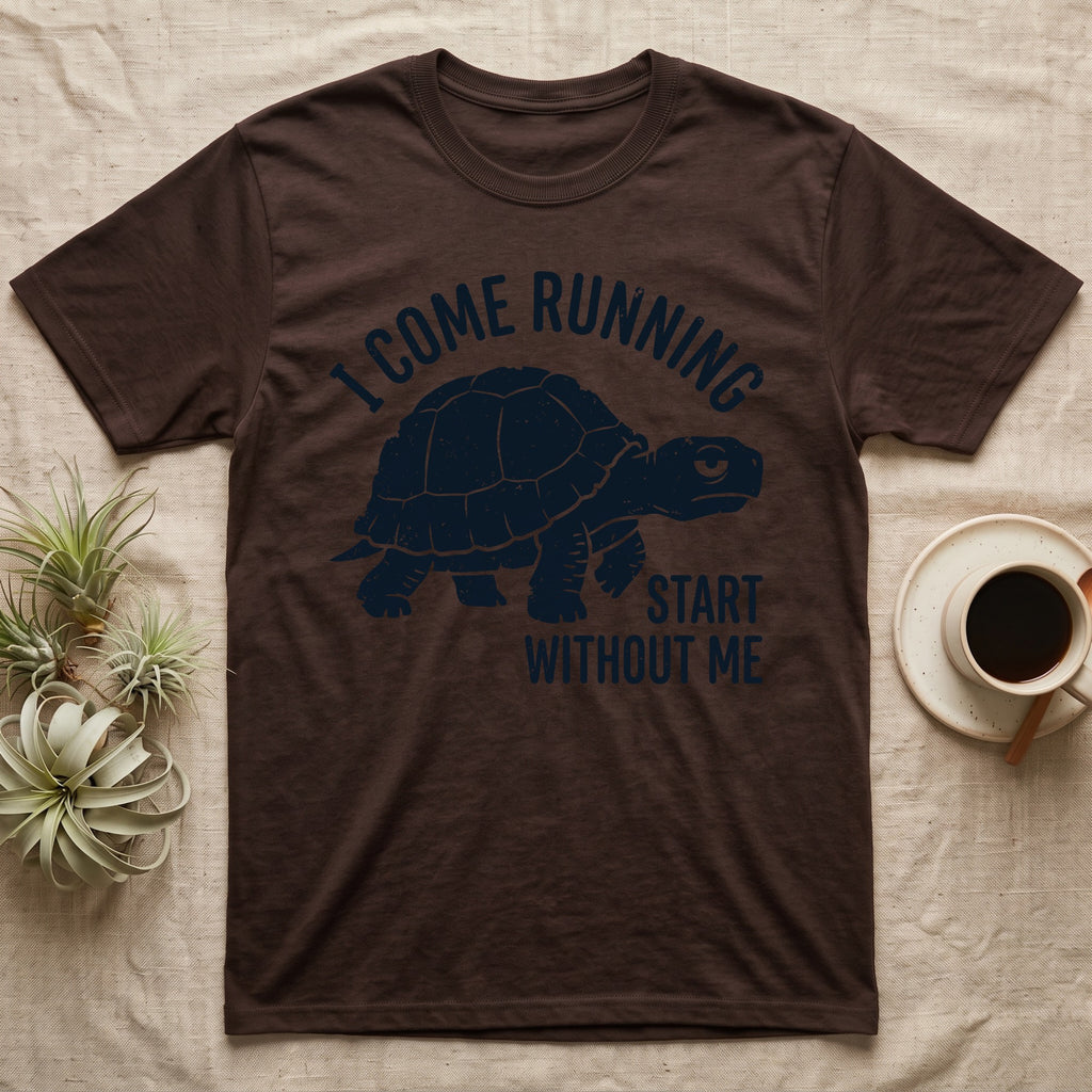 Red-Foot Tortoise Running T-Shirt in Dark Chocolate — Navy silhouette of a red-footed tortoise walking under arched words I Come Running, beside Start Without Me
