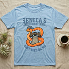 Corn Snake Don't Shed T-Shirt in Light Blue — Cartoon orange snake in a tricorn hat coiled around the Liberty Bell with text Don't Shed On Me.